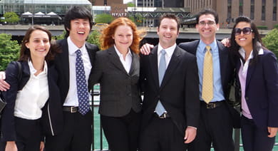 Members of the winning 2009 Kellogg team