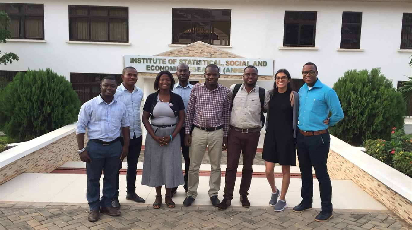 people standing outside of a Ghana institute