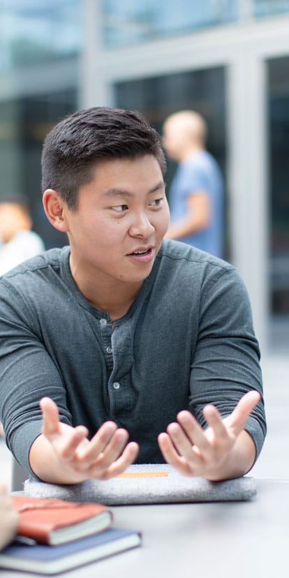 Kellogg students chatting outside the Global Hub on campus
