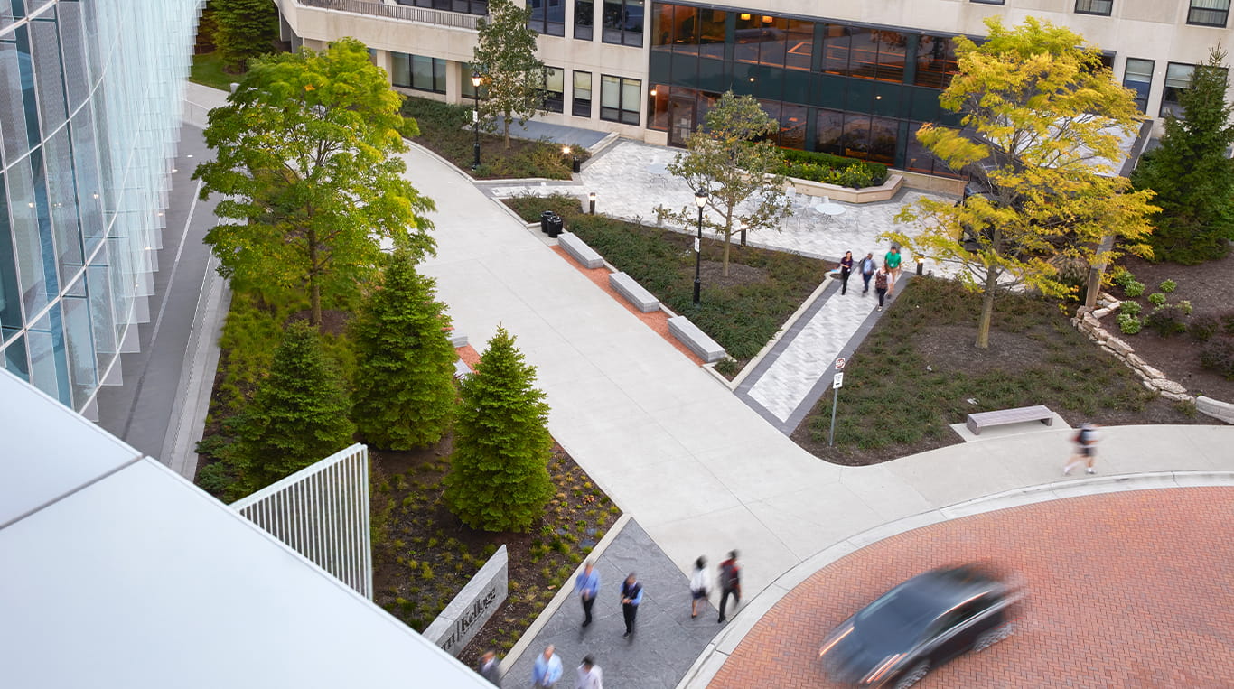 Birdseye view of Kellogg campus pathways outside as students walk to class