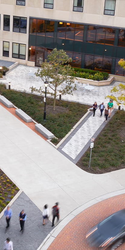Birdseye view of Kellogg campus pathways outside as students walk to class