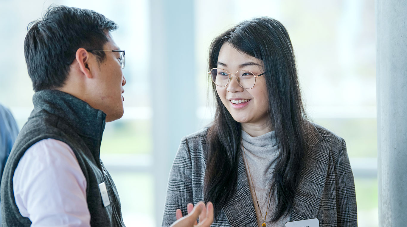 Kellogg students talking together