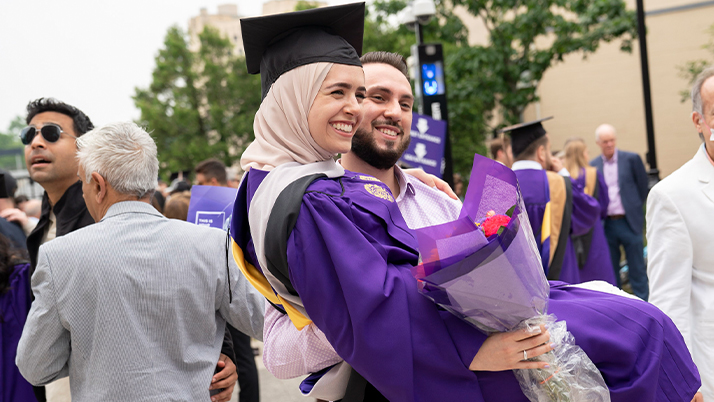 MBA Kellogg student celebrating graduation