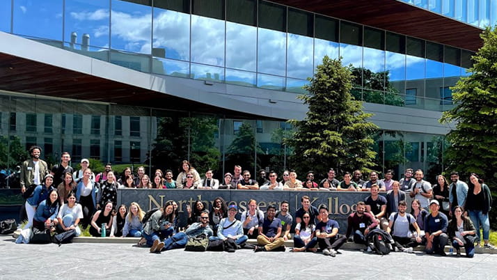 Kellogg MBA student Luis E Cerro Chiang and other students in front of The Global Hub