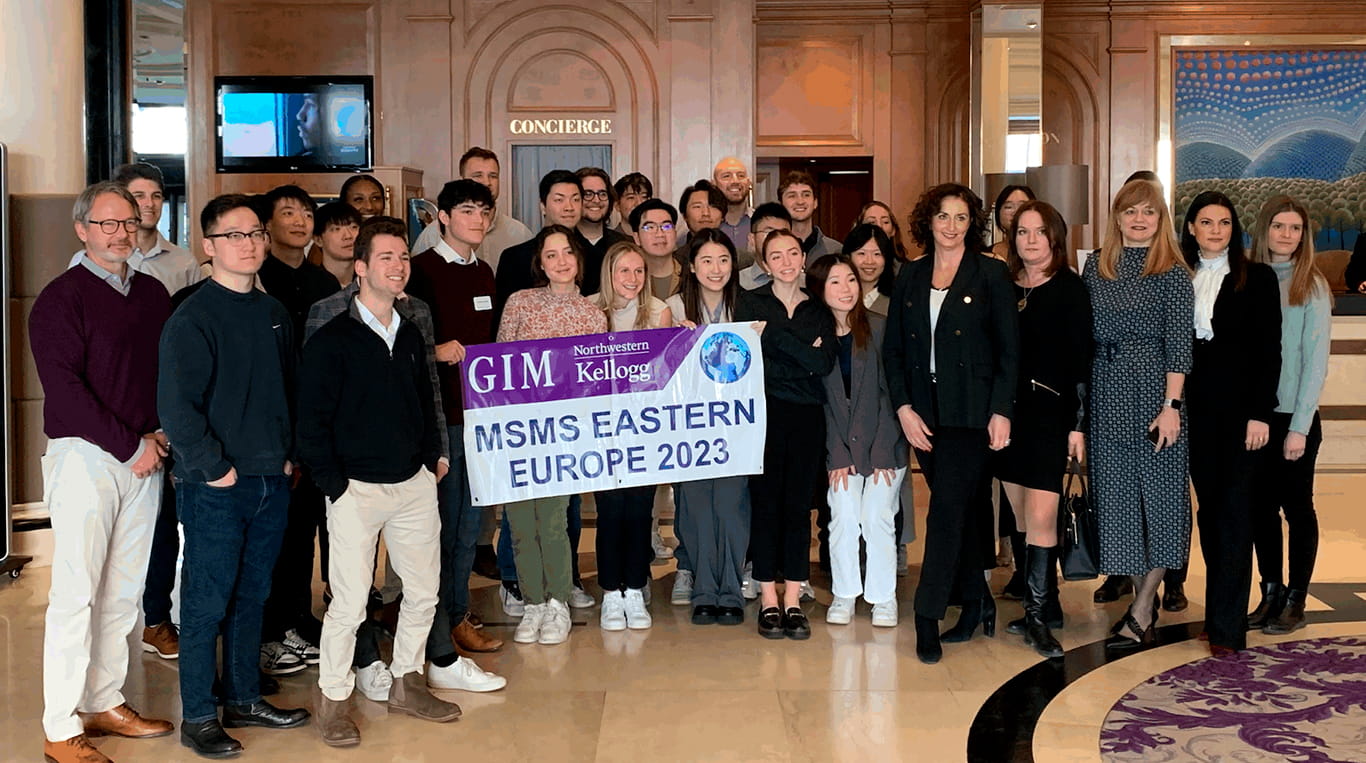 Students with a banner that says "MSMS Eastern Europe 2023"