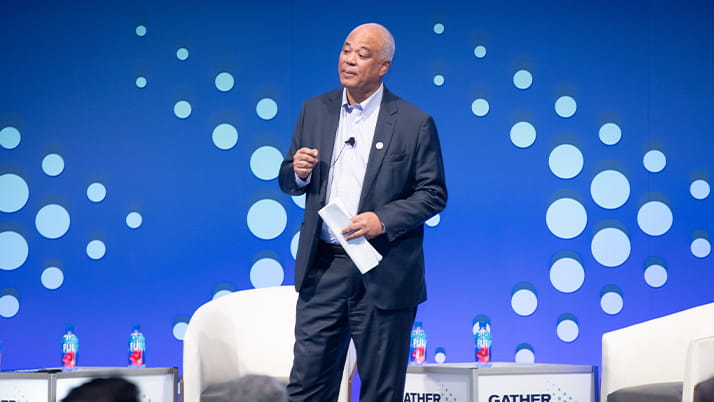 Alumnus Dwight Hutchins gives a keynote address at the Northwestern Mutual and Kellogg event "Gather against the gap."