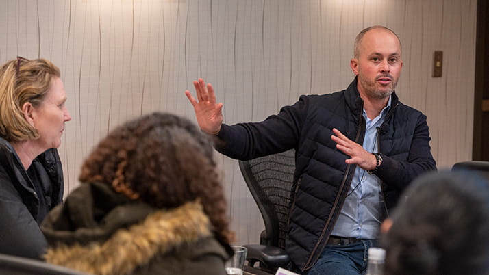 Oak Street Health founder and chief medical officer Griffin Myers speaks to students at the Healthcare Deep Dive course