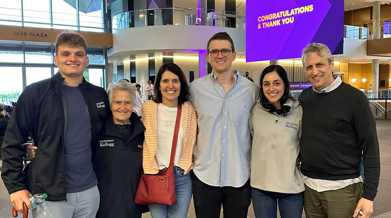 Danny Leemputte celebrating his MBA graduation with family at the Global Hub