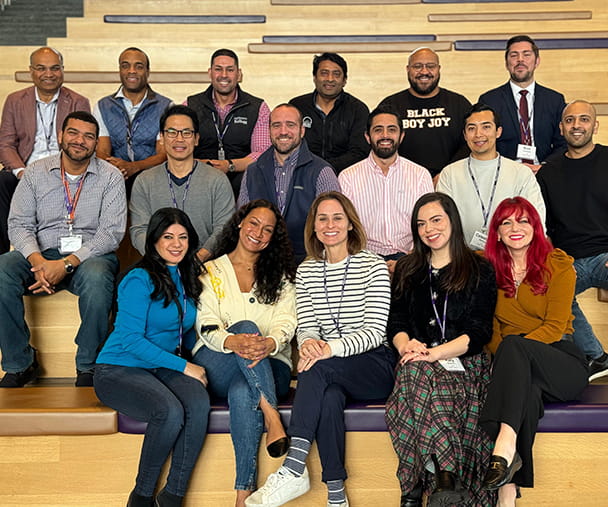 Kaly (first row, second from the right) with other Kellogg EMBA students