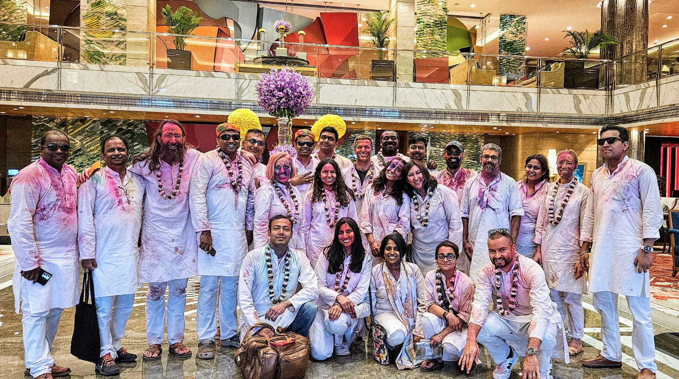 Kellogg students celebrate Holi in India during a Global Initiatives in Management (GIM) trip focused on Tech Ventures. Decked in traditional attire and vibrant colors, the group radiates the spirit of cultural immersion, camaraderie and joyful learning—hallmarks of the Kellogg global experience.