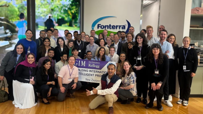 Group of Kellogg MBA students at Fonterra in New Zealand during an experiential trip.