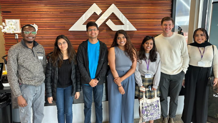 A group of MBA students standing at Kathmandu's lobby