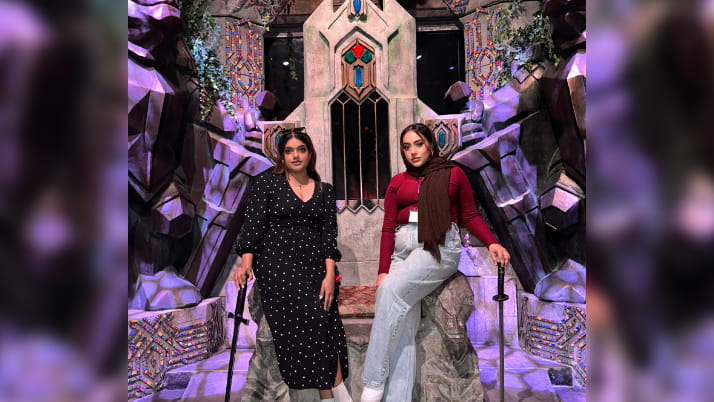 Two women at he Lord of the Rings Museum.