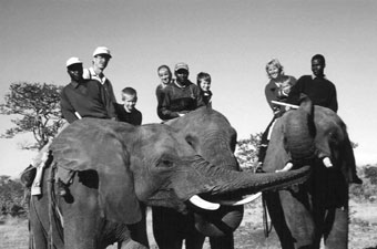 Greg Peterson '87 and family with their guides in Tanzania.