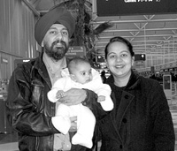 Purab Kaur with her husband, Amarpal Matharu, holding their daughter, Mayher Kaur Matharu