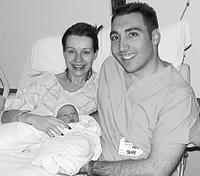 Chris Parisi and Stephanie with their very new daughter, Natalie Breen Parisi