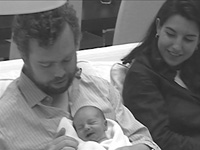 Ivan Espinosa de los Monteros with his new daughter, Claudia, and his wife, Rocio