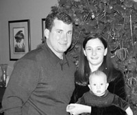 Andy Sandquist with his wife, Megan, and son, Callan Andrew