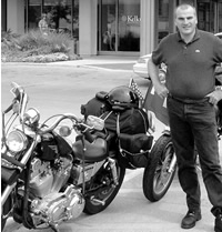 Alumni with his motorcycle