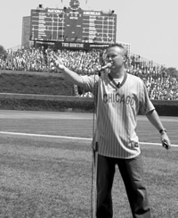 Alum Tim Smithe singing at Wrigley field