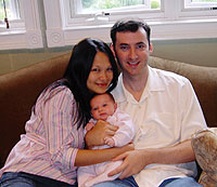 Marie-France and Douglas Greer (both '01) celebrate the birth of their daughter Kelsey on July 23.