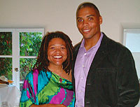 Nicole Gilmore '02 with husband Hise Gibson.