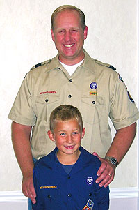 Pack 64 Cubmaster Scott Abbott '03 and his son, Cub Scout Nick Abbott.