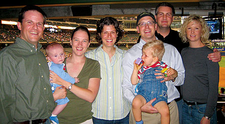 Bill Nahmias '03, Andrew Nahmias, Joann Nahmias, Sue Nolte, Truman Nolte, Chris Nolte '03, Dave Schreiber '04 and Jen Armstrong enjoy a Brewers victory at Miller Park.