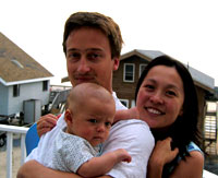 Ian Milward '02 and Jenny Liang Milward '03 enjoy the last days of summer with their son Charlie (3 months).