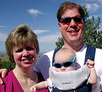 Kevin Pendleton '03, wife Michelle, and new son Evan chill in the mile-high Denver sun.