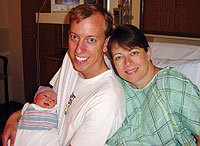 Mike Anderson '97 and wife Susanne with their new daughter Claire Marie.