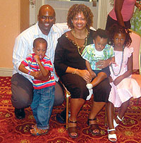 Law Burks '00, wife Cyndi, daughter Jessica and sons Joshua and Jonah at a family reunion in Las Vegas.